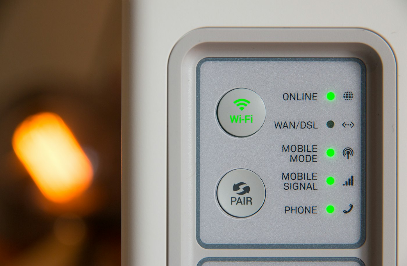 Status lights on a home internet gateway, one marked for mobile signal